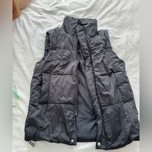 Black puffer vest size small